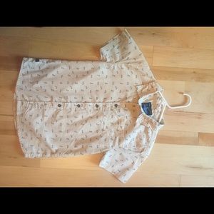Boys’ button down light cotton shirt.